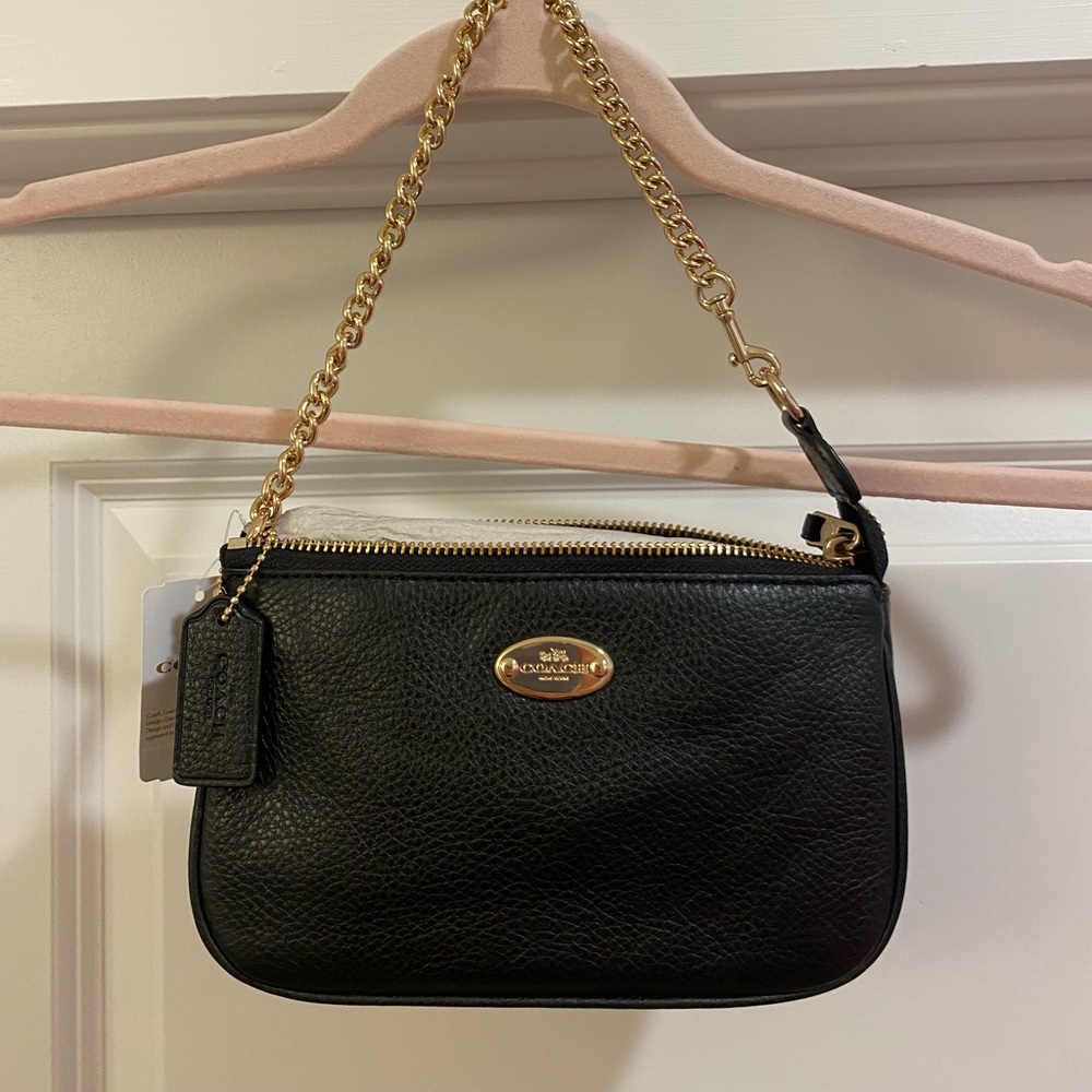 New with tags Coach wristlet with gold chain